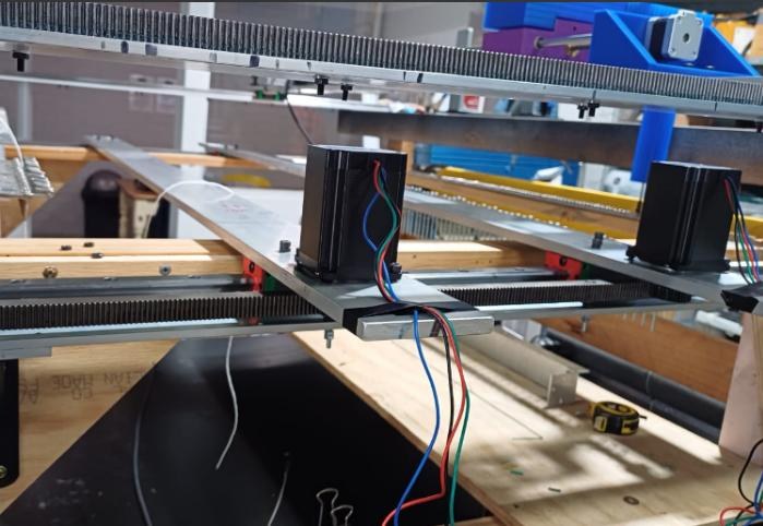 The finished beam drive: a stepper motor on a rack and linear rail