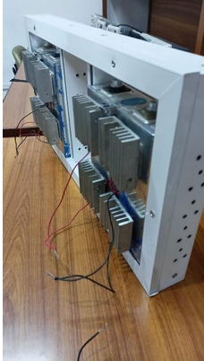 The prototype frame seen from the side, with heat sinks and thermoelectric coolers